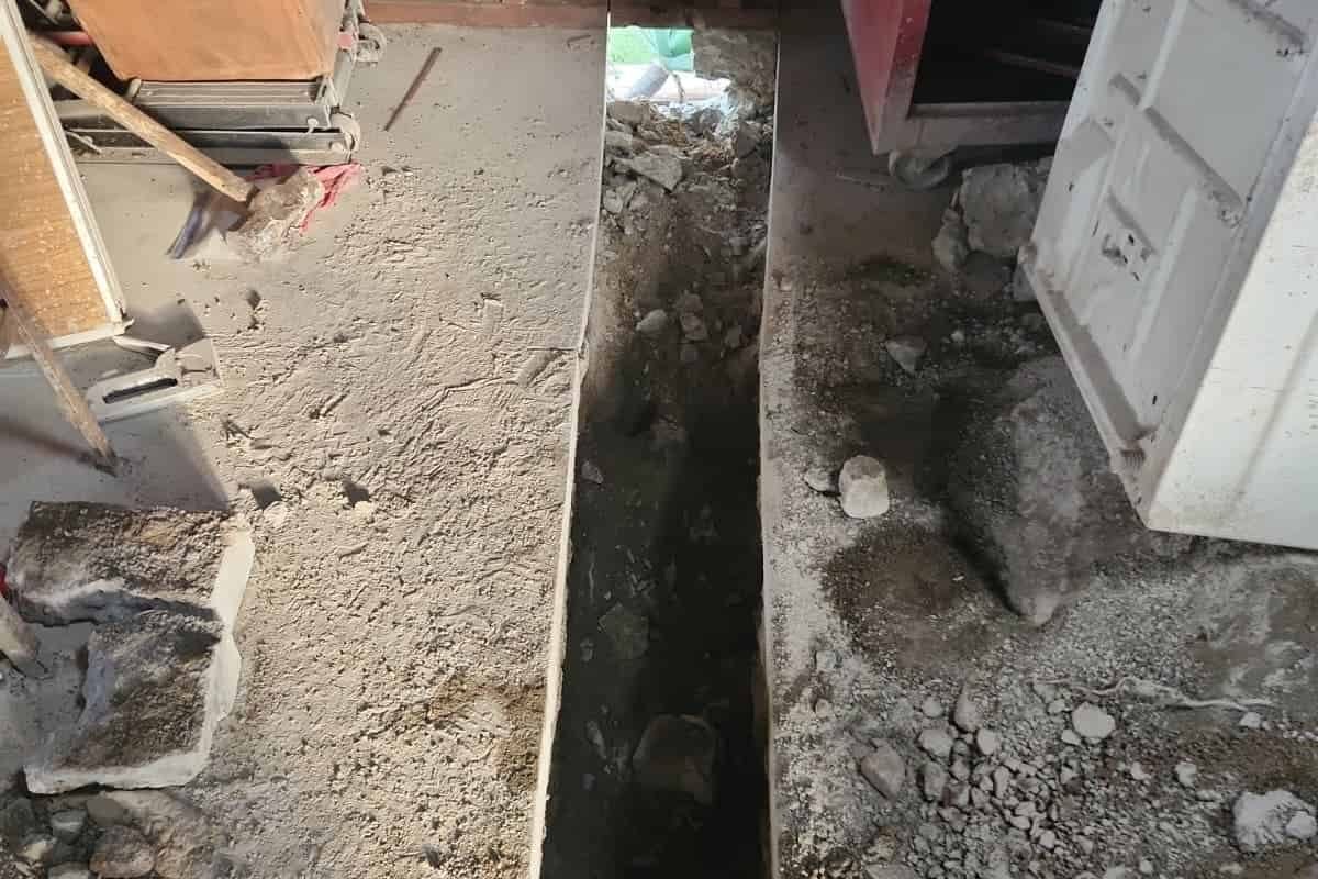 Foundation trench for masonry work at home construction site.